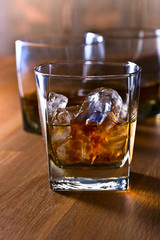 Glasses of whiskey with natural ice