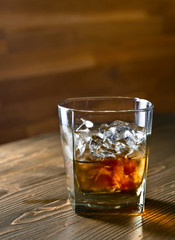 Glasses of whiskey with ice