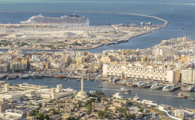 Fototapeta premium DUBAI - NOVEMBER 2016: Aerial city view from helicopter. Dubai is a fast advancing metropolis