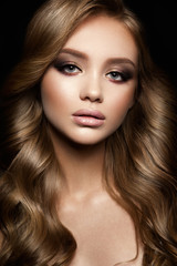 Fototapeta premium Beautiful woman with professional make up and hairstyle