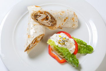 Rolls from pita bread stuffed with chicken mushroom and onion