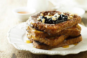 French toasts with cinnamon, honey and nuts