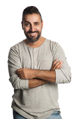 Obraz premium Handsome mature man standing against a white background wearing a bright sweatshirt with a big smile. 