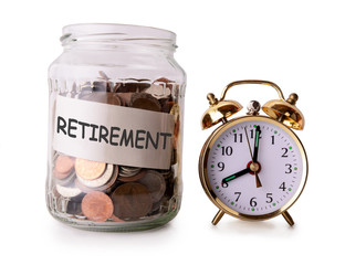 Coins in glass jar for retirement