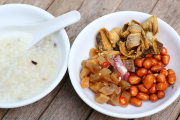 porridge rice gruel with peanuts, Radish and Small dried fish.