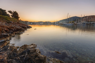 View of a marina in Lakki village on Leros island in Greece early in the morning. 
