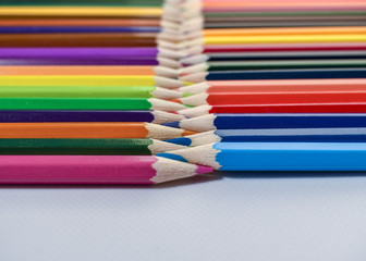 colored pencils on white background