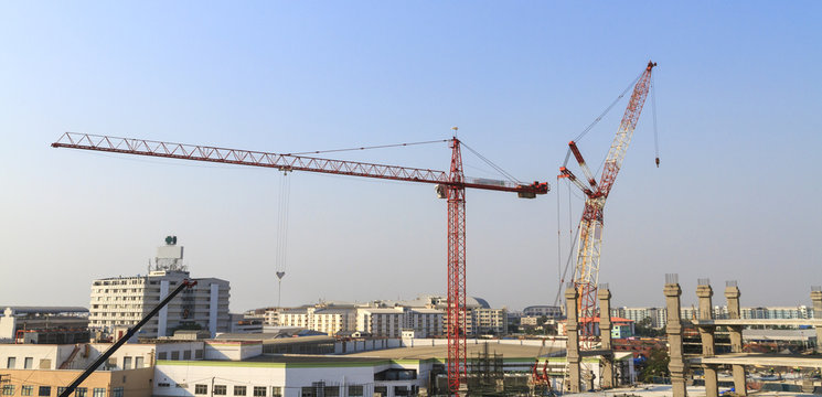 Construction site with many construction cranes.