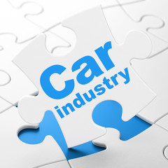 Manufacuring concept: Car Industry on puzzle background
