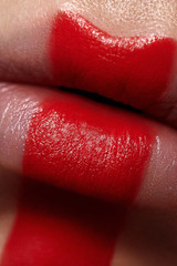 Macro beauty Woman's Lips with red Paint