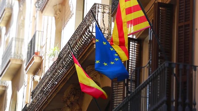 Flag of Europe and Catalonia on a Balcony in Barcelona, Spain
