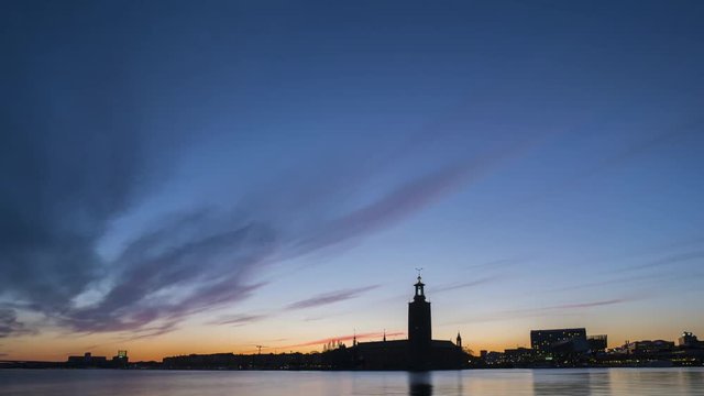 Timelapse of the City Hall in Stockholm at dusk.