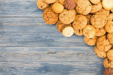Cookies and biscuits at blue wood with copy space