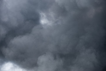 Fototapeta na wymiar Large black billowing smoke cloud background texture organic pattern