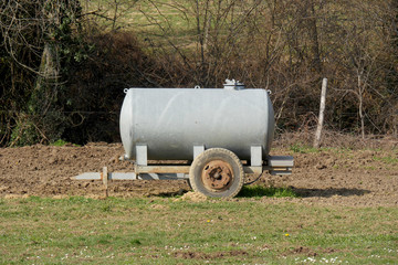 traditional cattle watering tank on a meadow
