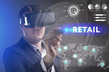 Business, Technology, Internet and network concept. Young businessman working in virtual reality glasses sees the inscription: Retail