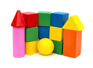 different color and shape wooden toy blocks on white background