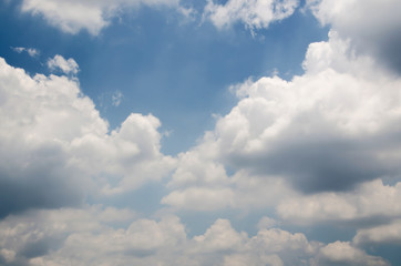 Blue sky with white cloud and partial dark clouds. Sky cloud. 