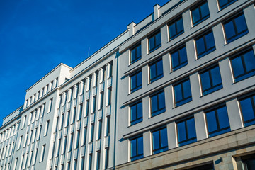 Fototapeta premium white and big office buildings with high contrasts