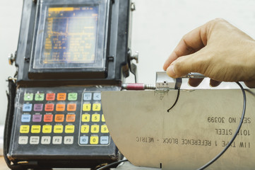 Calibration standard probe of ultrasonic test with reference block.