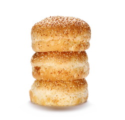 Three burger buns with sesame isolated on white background