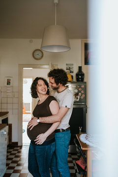 pregnant couple in the kitchen