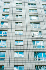 high angle format of white plattenbau facade