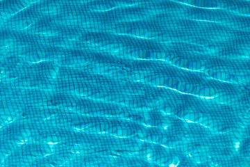 Surface of the water in the pool. Texture of the water