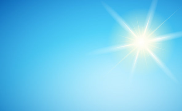 Blue sky with radiant sun - Background