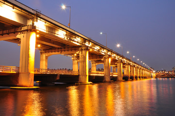 Bridge with lights during night time