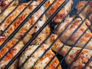 The chicken is fried on the grill