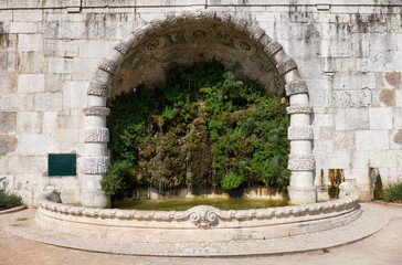 Green fountain in the San Pedro de Alcantara Garden. Lisbon. Portugal.