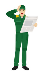Worker with newspaper grabbed his head