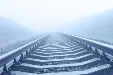 railroad closeup to horizon in fog