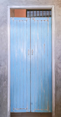 The retro style ancient and antique wooden door opening and view of vintage garden .