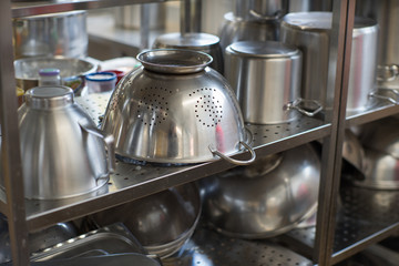 Kitchen equipment. Stainless steel pots.