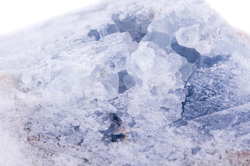 macro mineral celestite stone on a white background