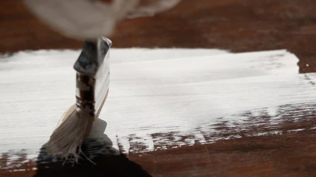 Painting of wooden furniture with white paint