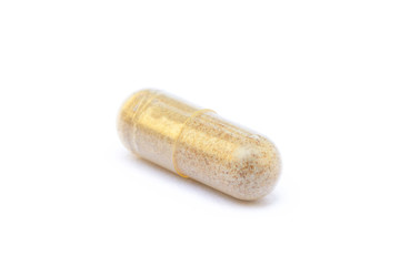 Natural medicine capsules isolated on a white background