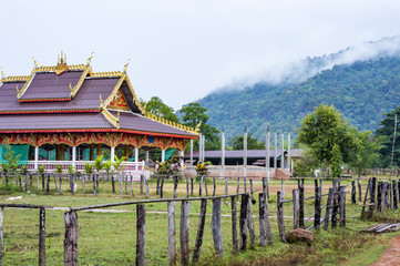Fototapeta na wymiar Buddhist temple in the mountains in Champasak Province, southern Laos
