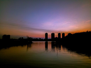 Fototapeta premium Evening sky sunset light reflecting water