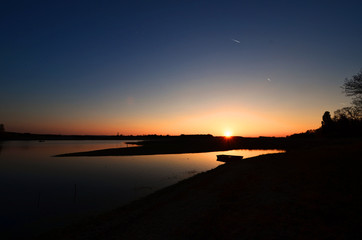 Sunset over a quiet lake
