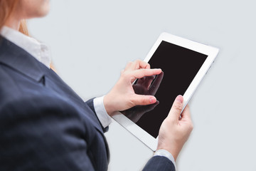 Attractive Modern business woman Hand Touching and Using Digital tablet Screen in Suit . Analyst Department Researching Process . Young Girl Working New Startup .