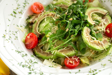 Delicious healthy avocado and arugula salad