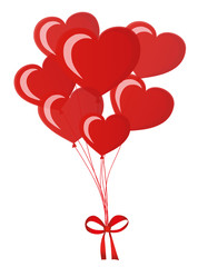 Fototapeta na wymiar Balloons in the shape of heart bandaged with ribbon and bow