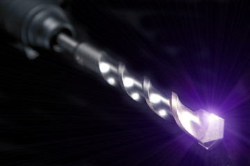 drill of the industrial puncher on  black  background..
