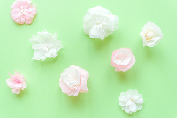 color paper flower on green background