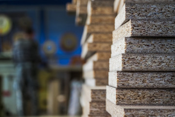 Obraz premium Folded in bundles of a part of particle Board to furniture manufacture. 