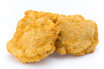 Fried chicken nuggets isolated on white.