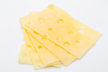 Cheese slices on white background cutout.